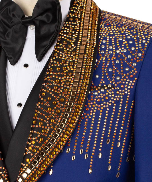 Majesty boutique Blue tuxedo with gold embellishments and a black bow tie