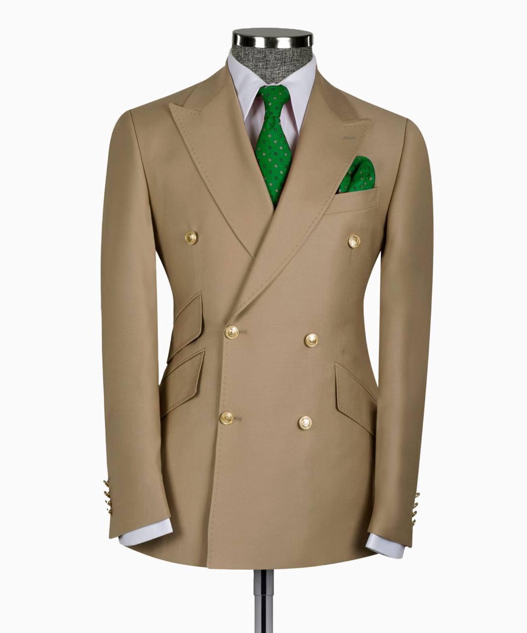 Beige double-breasted suit jacket with green tie and pocket square on a mannequin against a white background