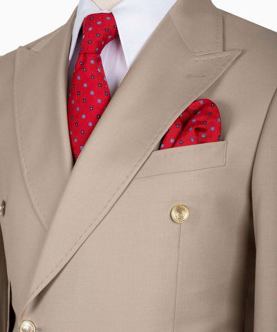 Beige suit jacket with a red patterned tie and pocket square on a white background