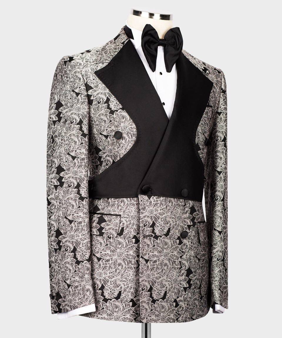 Black and white patterned tuxedo on a mannequin against a light gray background