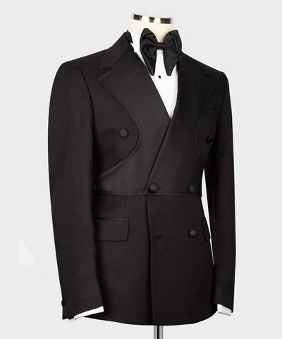 Black tuxedo jacket on a mannequin with a white background