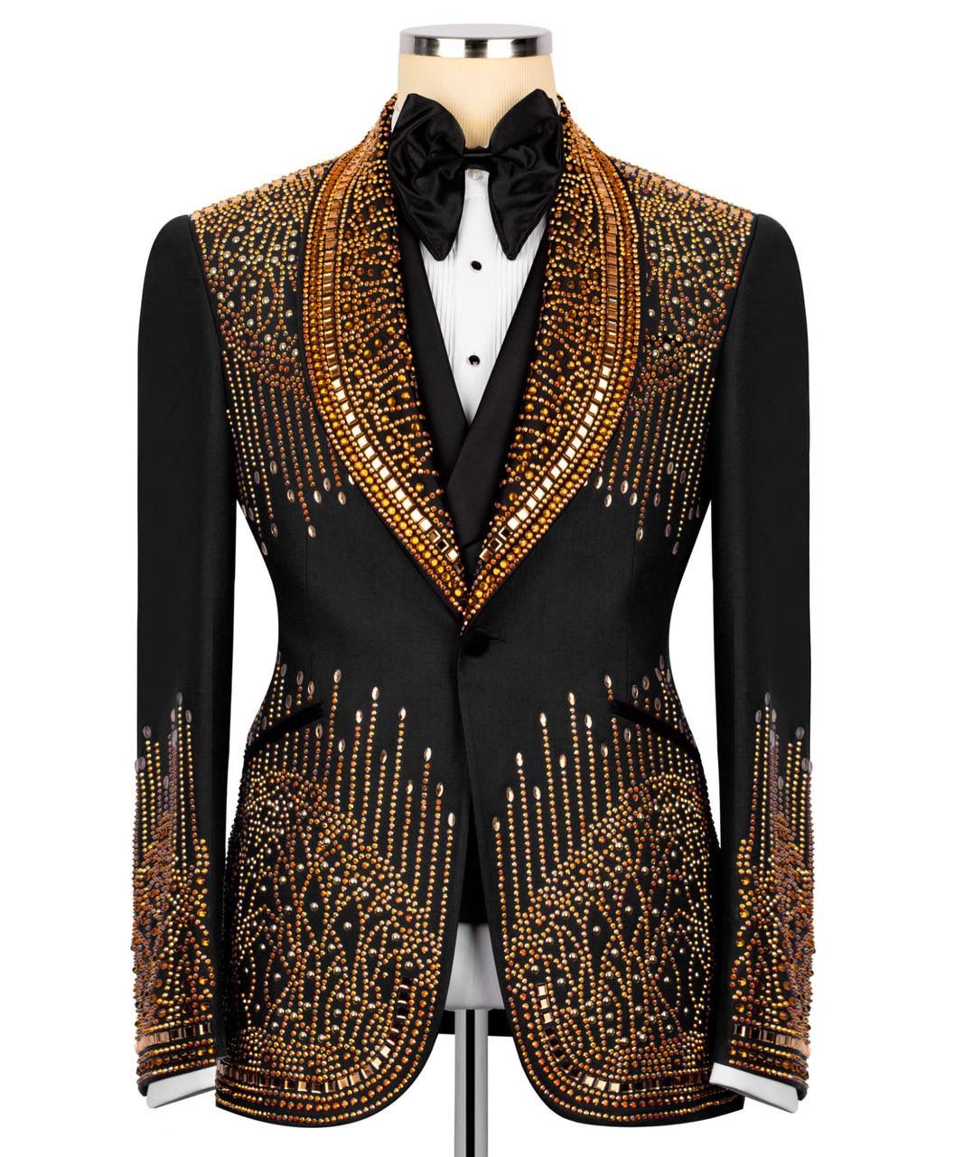 Black tuxedo jacket with gold embellishments on a mannequin against a white background