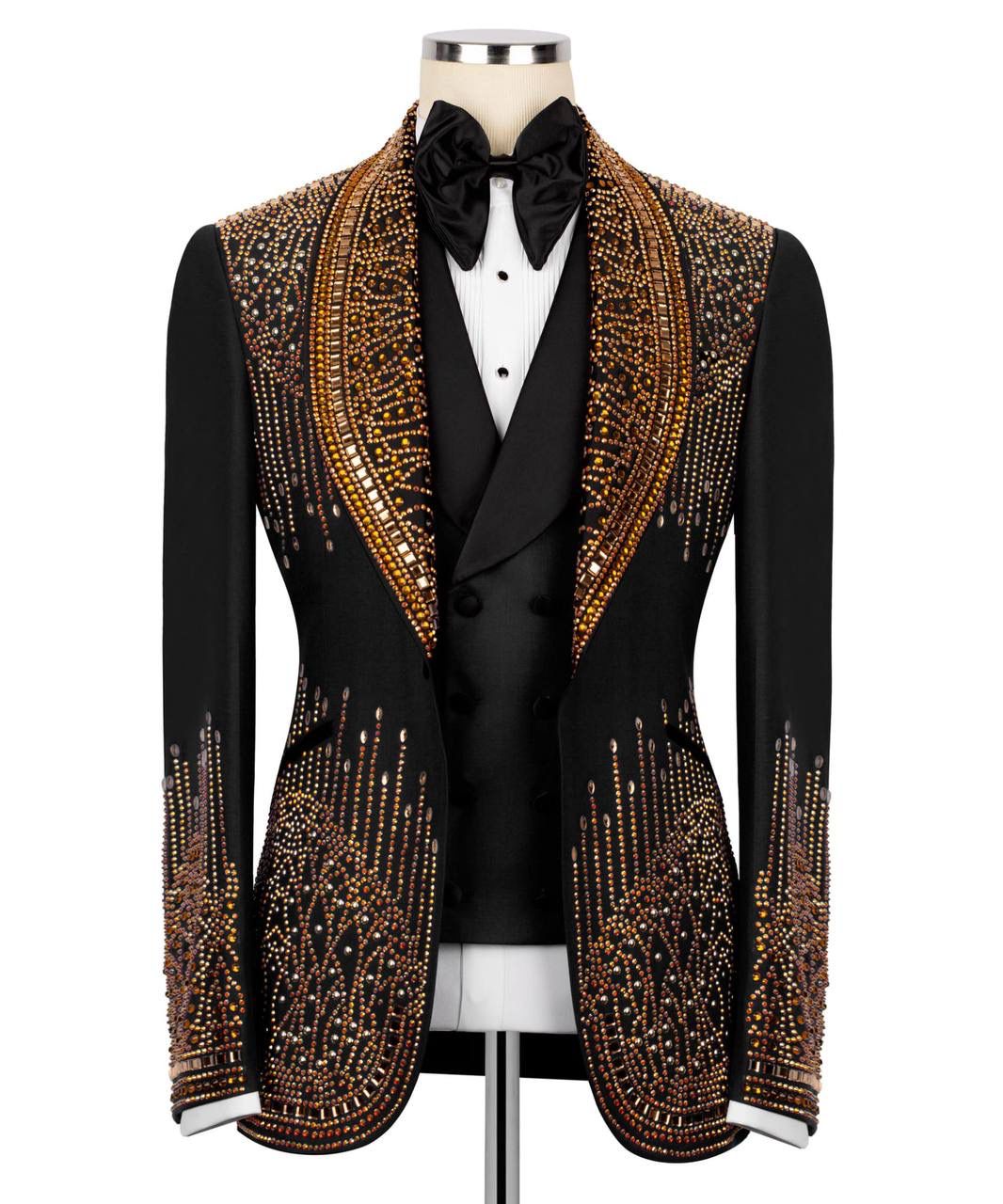 Black tuxedo with gold embellishments on a mannequin against a white background