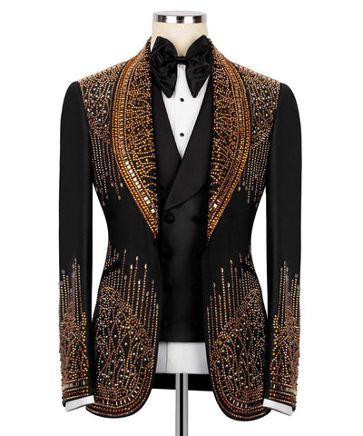 Black tuxedo with gold embellishments on a mannequin against a white background