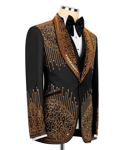Black tuxedo with gold embellishments on the entire suit