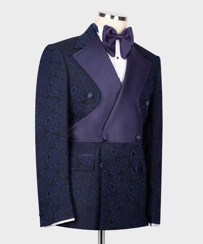 Blue patterned tuxedo with purple vest and bow tie on a mannequin against a white background