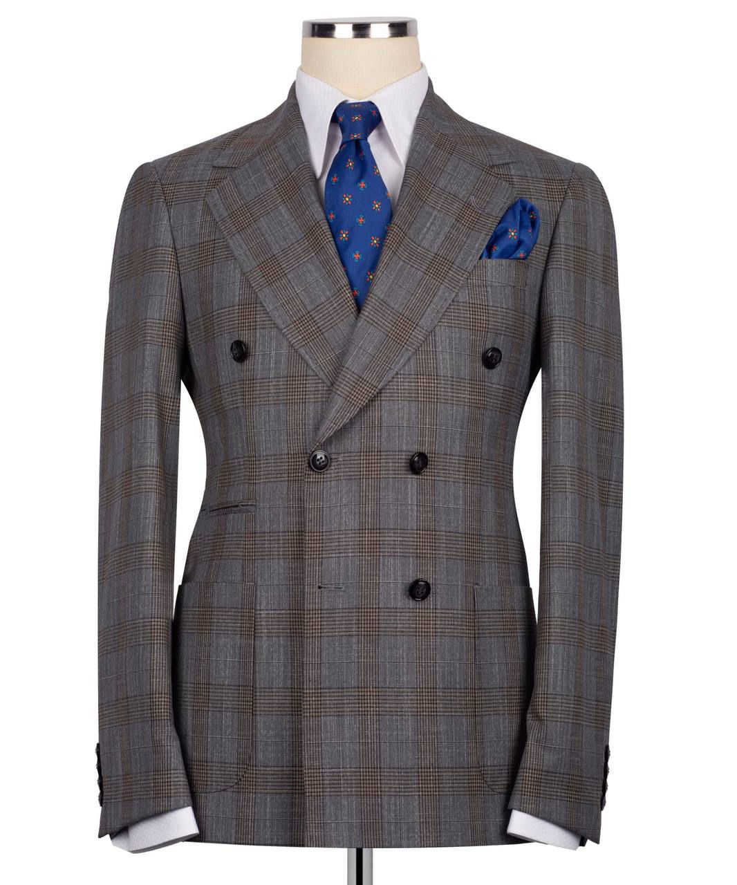 Gray checkered double-breasted suit with blue tie and pocket square