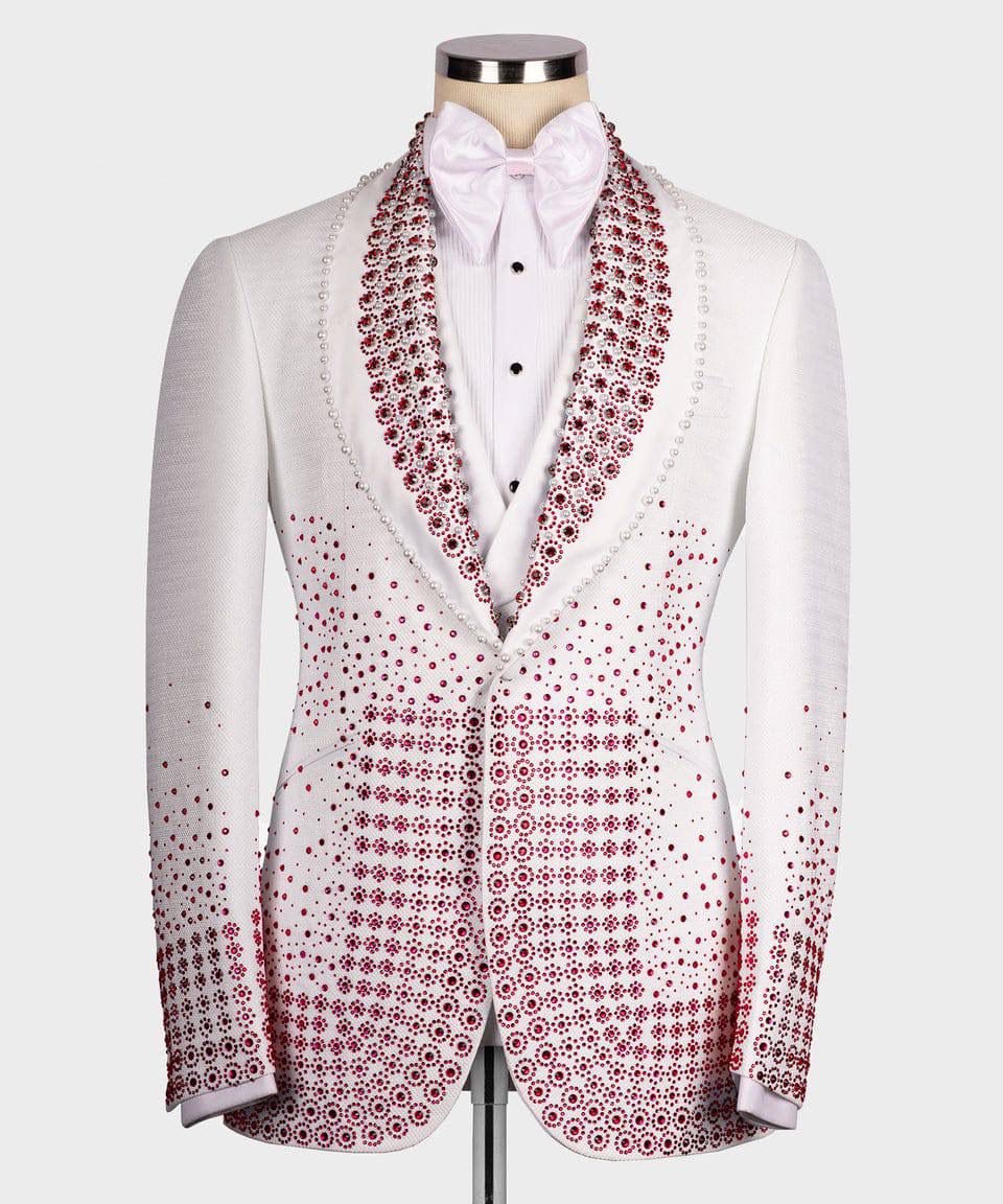 White dinner jacket with red pattern on a mannequin against a white background