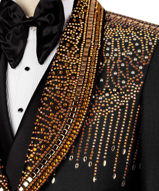 majesty boutique Black tuxedo with a bow tie and gold embellishments on the lapel.