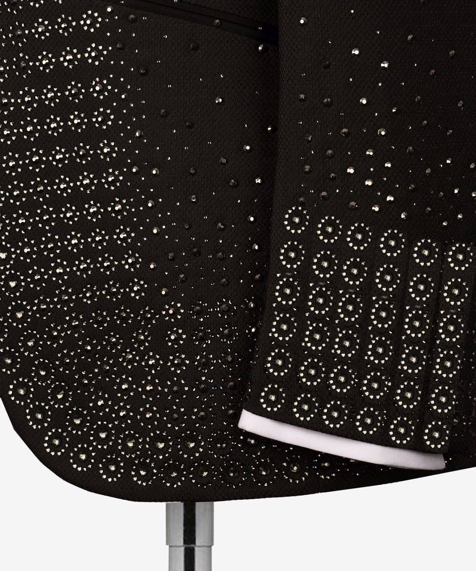  rhinestone embellishments on a tuxedo suit 